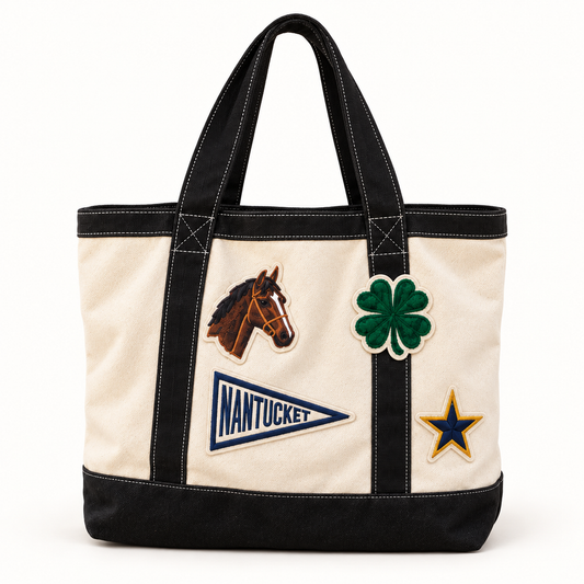 Natural and black canvas boat tote with Nantucket pennant, horse, four leaf clover and star patches, a coastal gift for her
