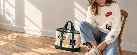 Custom patch tote bag and crewneck sweatshirt for event merch