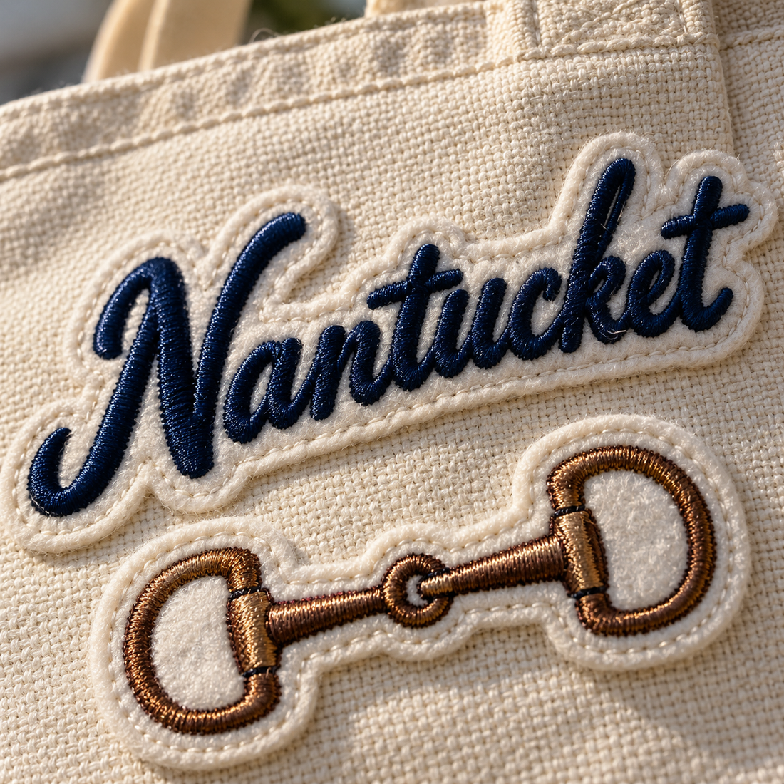 Close-up of Nantucket script and horse bit embroidered patches, a custom gift idea