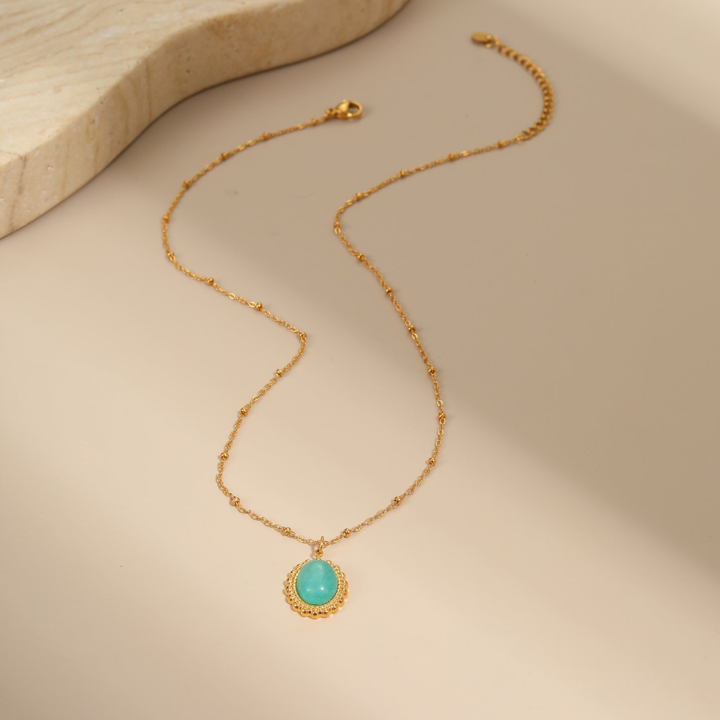 Natural Stone Pendant Paired With A Stainless Steel Necklace